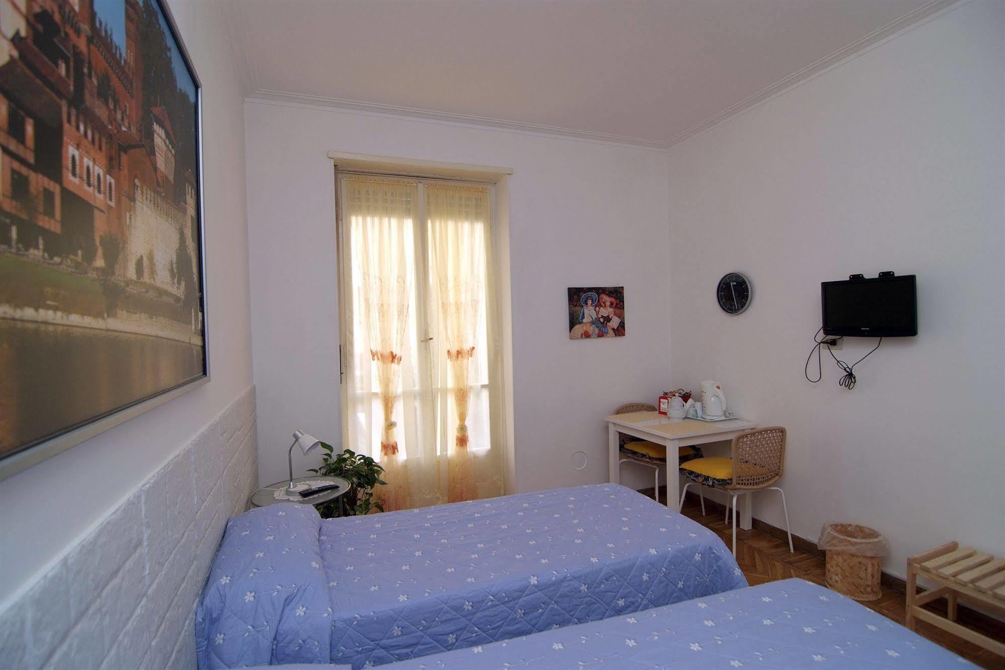 Camera Matrimoniale/Doppia con Letti Singoli con Balcone